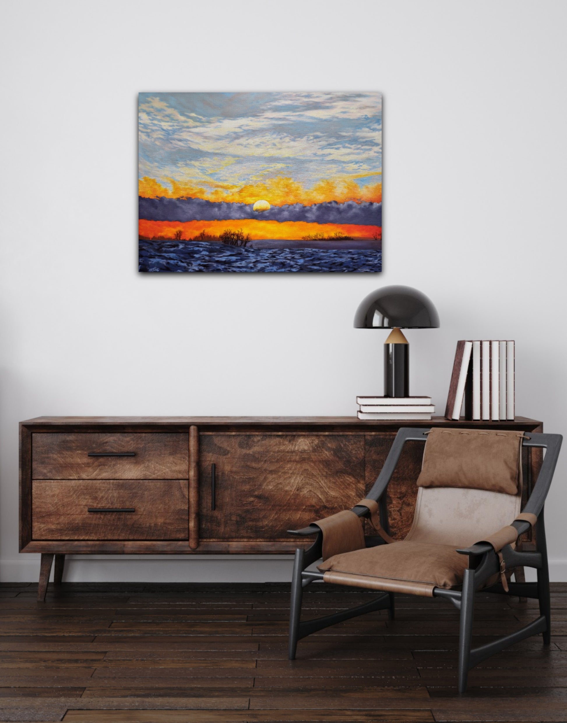 Unveiling Dawn, an original oil painting of a winter sunrise over the prairies on a white painted wall