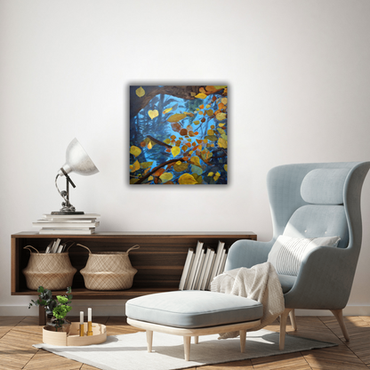 Cozy reading chair with side table and painting of a heart shaped puddle with leaves behind it